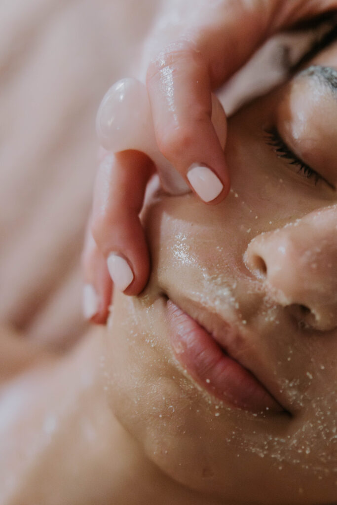 kerry spindler working on a facial for a client